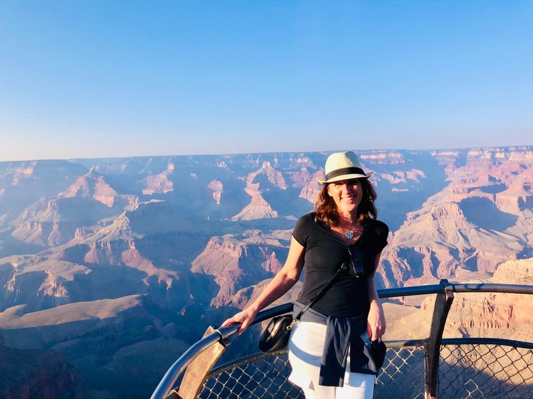 Claudia in a Panama hat at the rim of the Grand Canyon