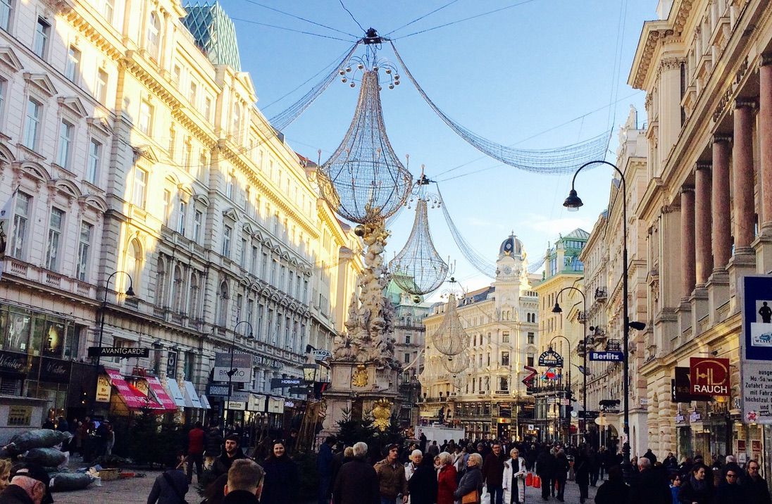 Vienna’s Graben at Christmas, with chandelier lights strung above the crowd